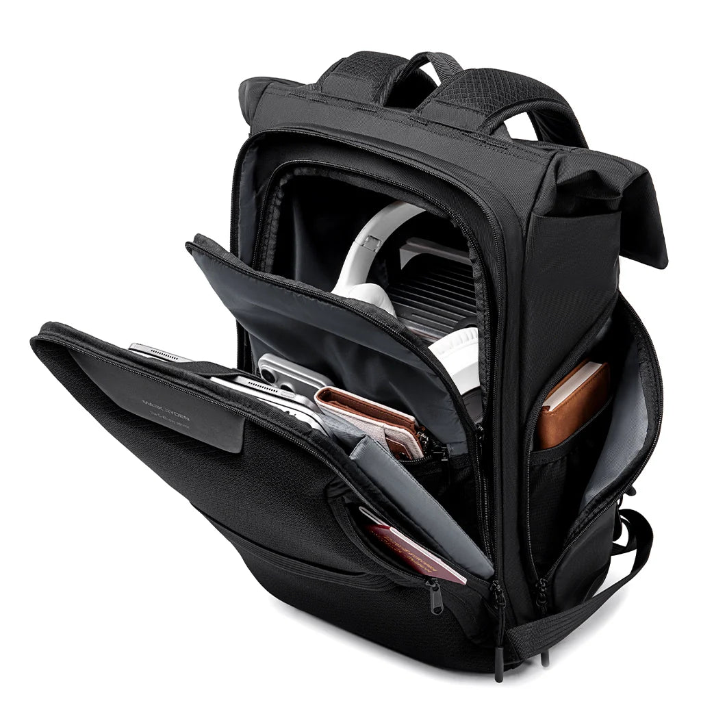 Mark Ryden Global's MorphCore expandable travel backpack with open compartments showing tech & travel accessories